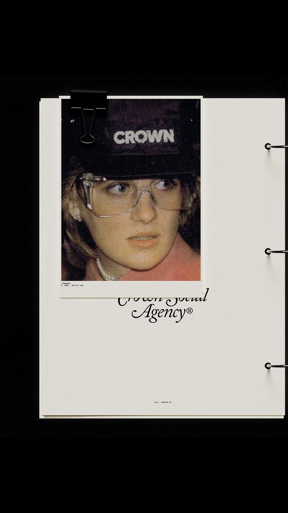 A photograph of a person in a baseball cap and jacket.