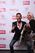 Man standing next to woman.